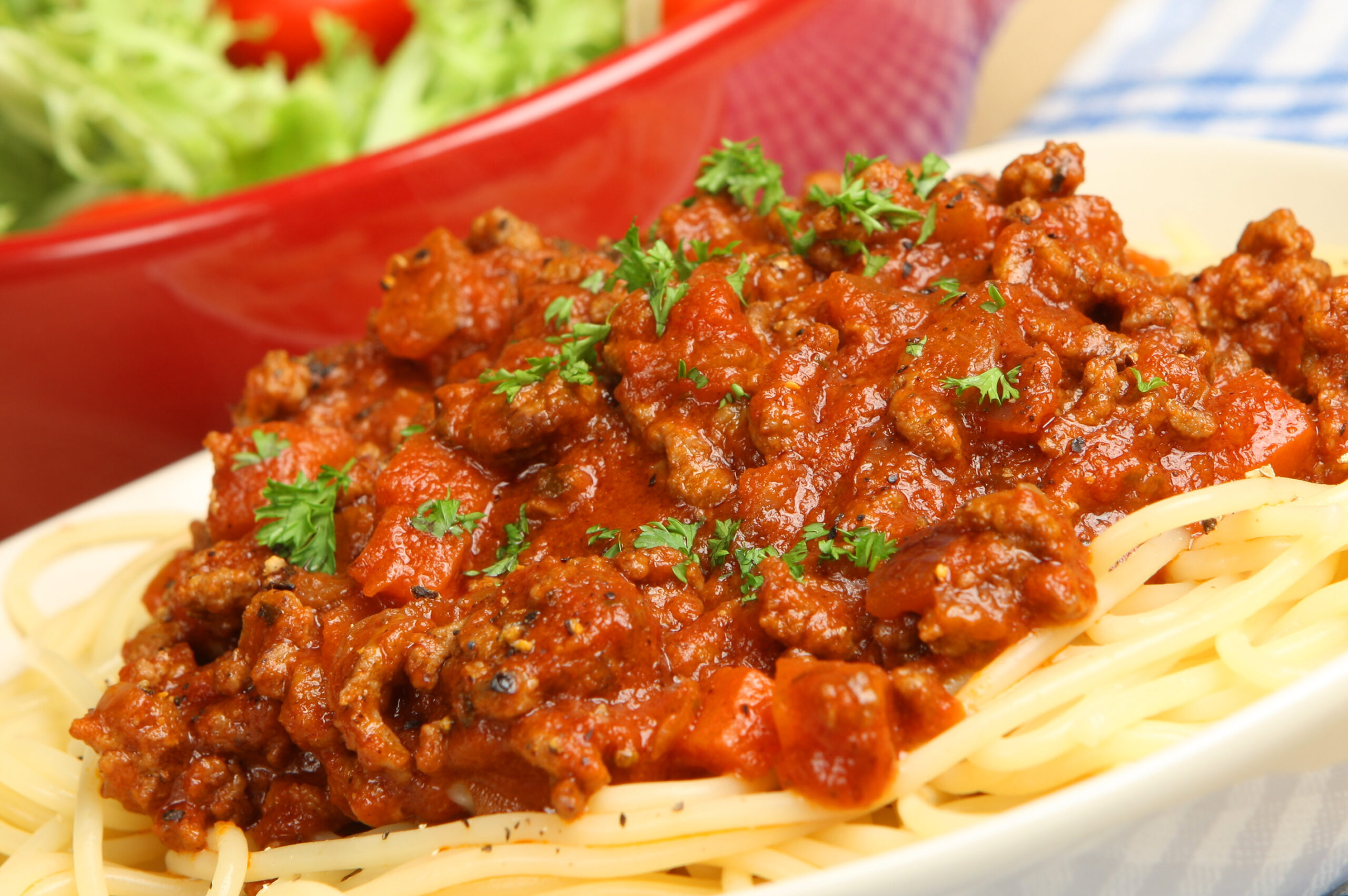 Spaghetti bolognese with side salad